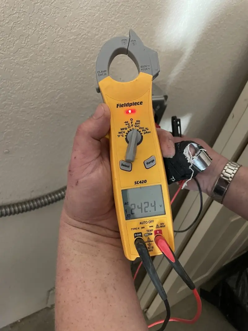 Voltage testing with clamp meter during Aluminum Wiring Replacement in Gilberts